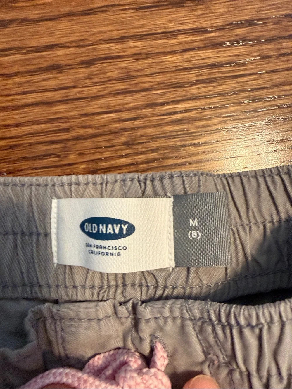 Size 8/M girls bundle of 3pull-on shorts from Old Navy. Pink, gray, khaki.